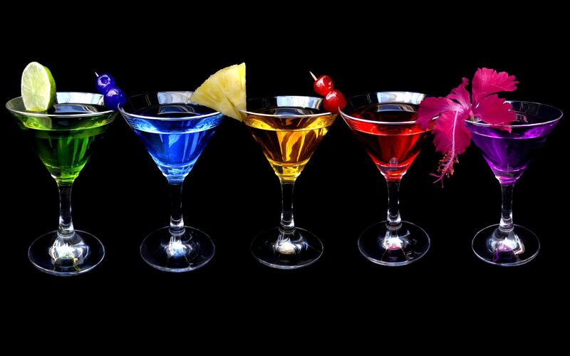 Colorful cocktails in martini glasses