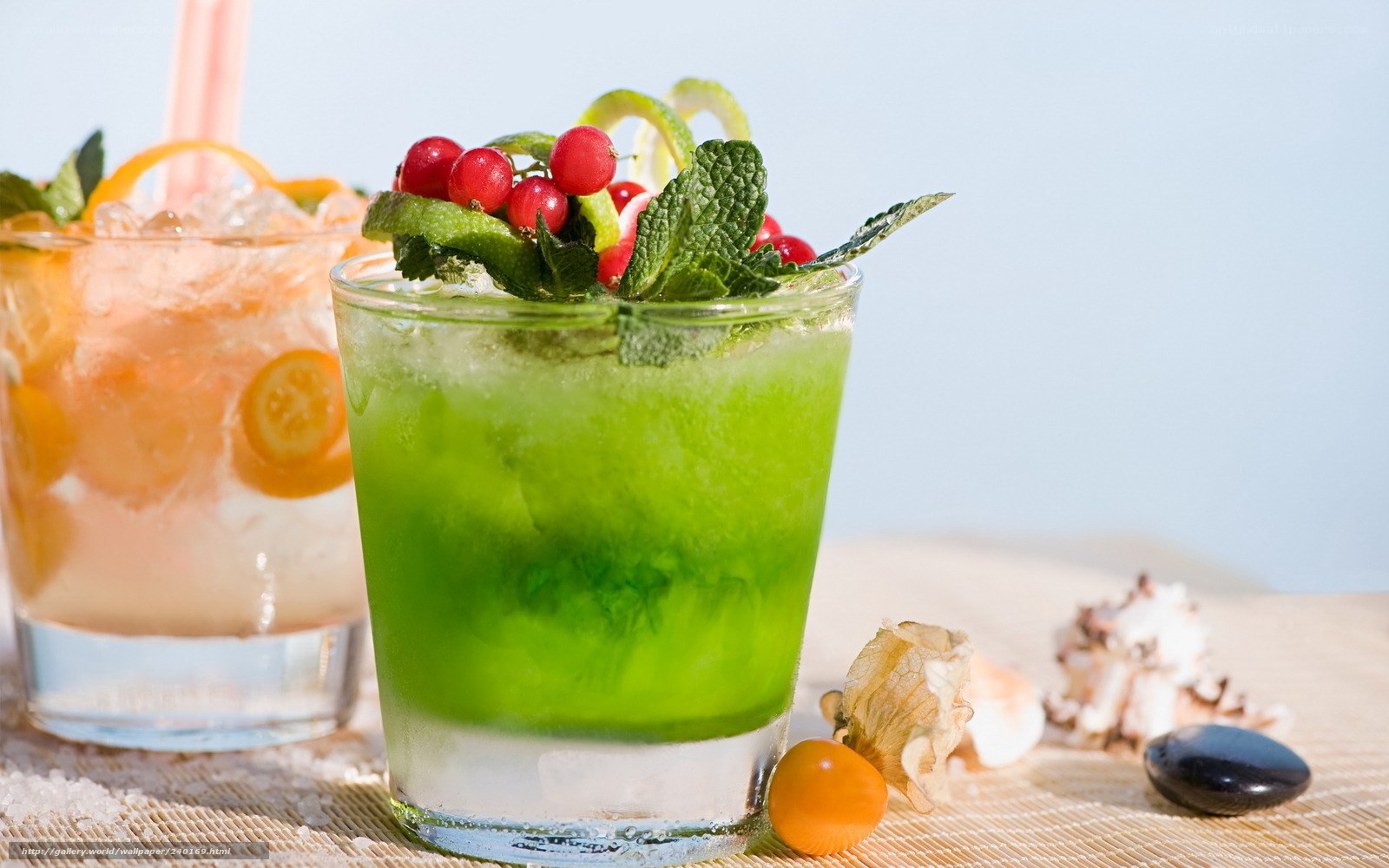 Colorful cocktails with fruit garnish