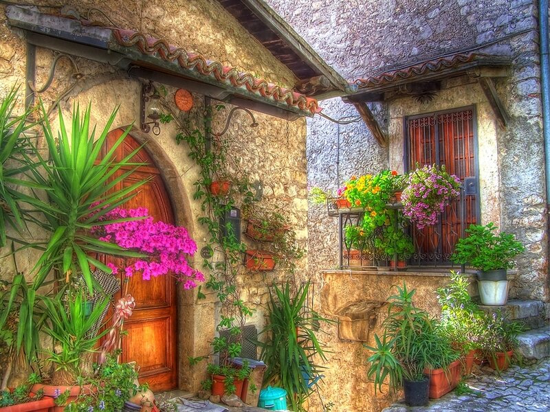 colorful courtyard with wooden door