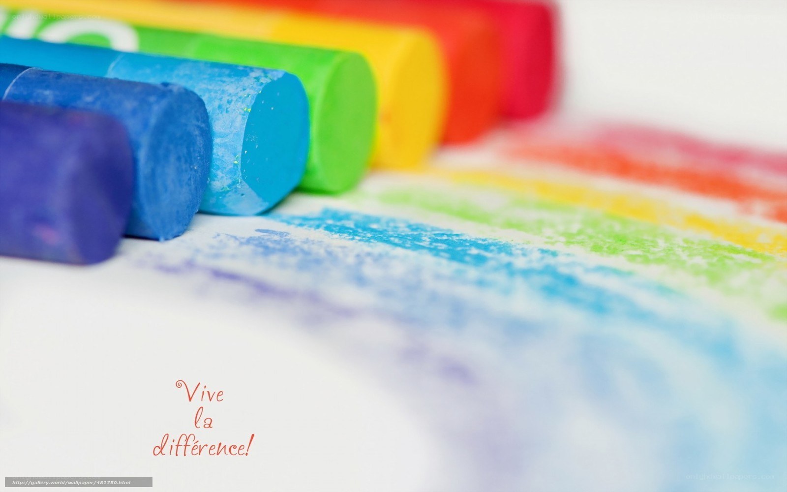 Colorful crayons and rainbow drawing