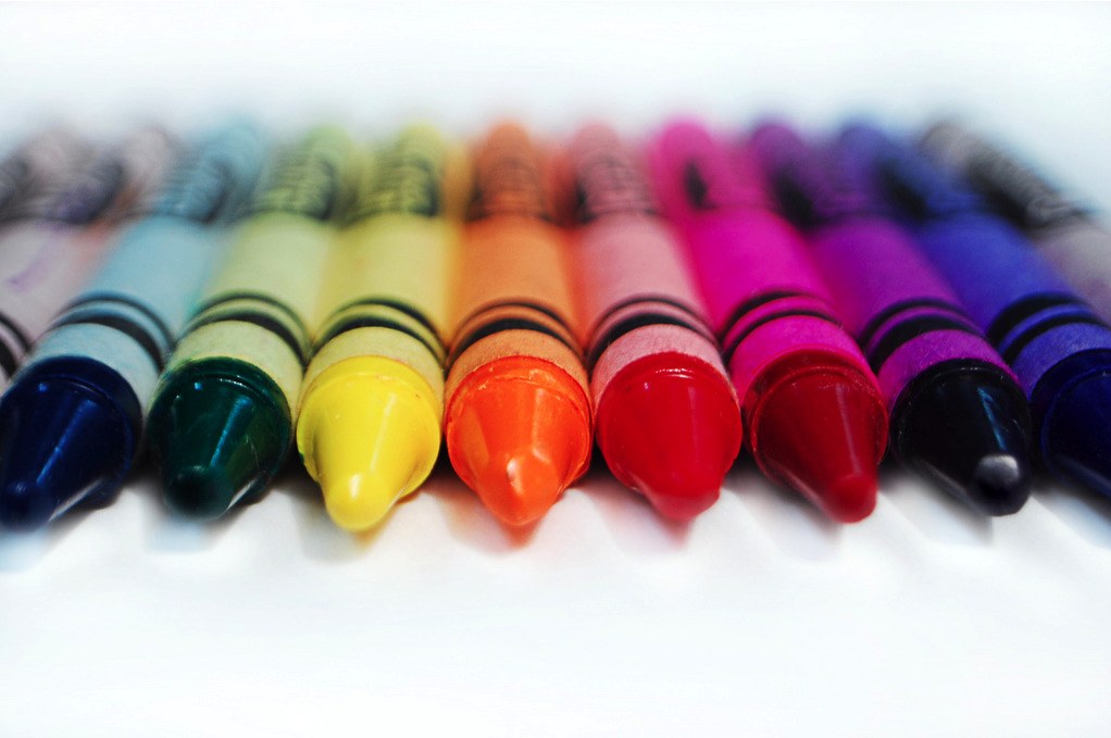 Colorful crayons in a row