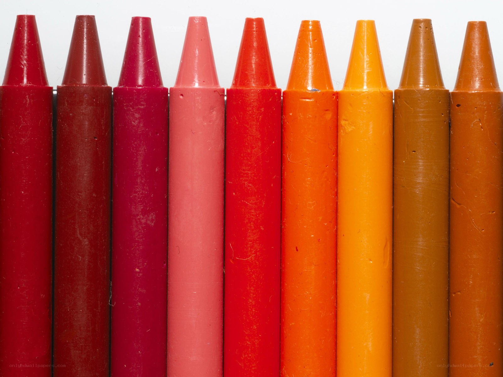 Colorful crayons in a row
