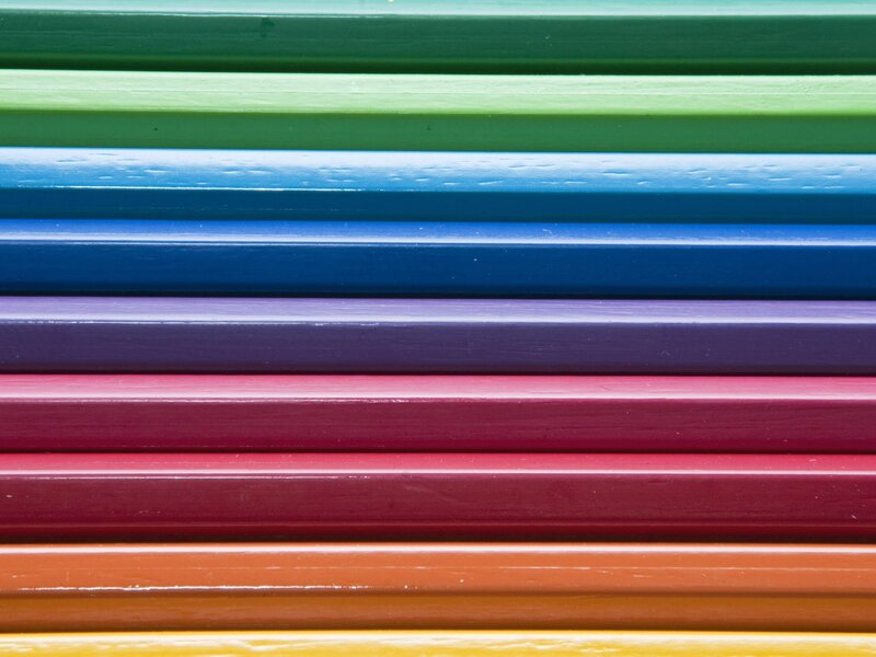 Colorful crayons in a row
