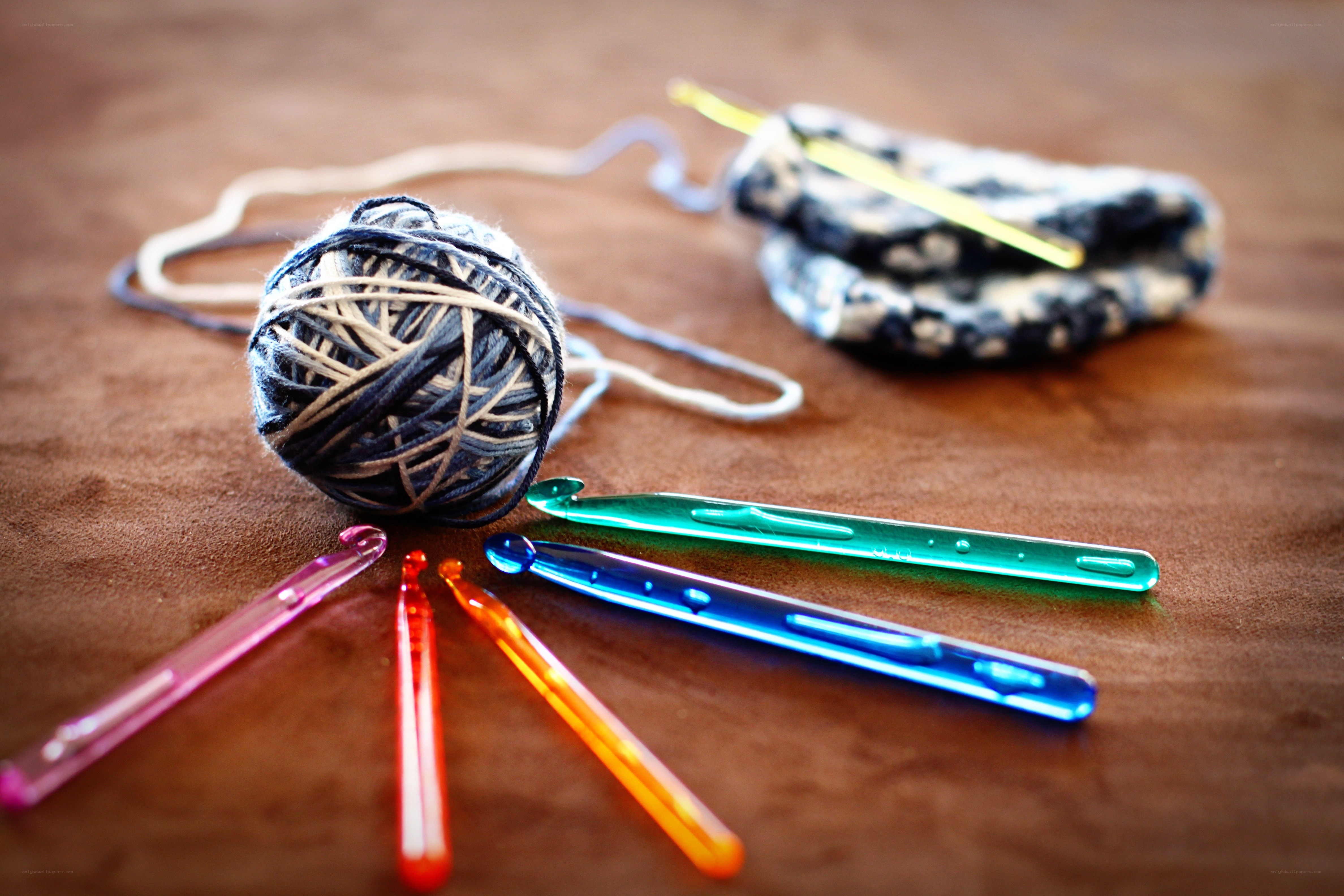 Colorful crochet hooks and yarn