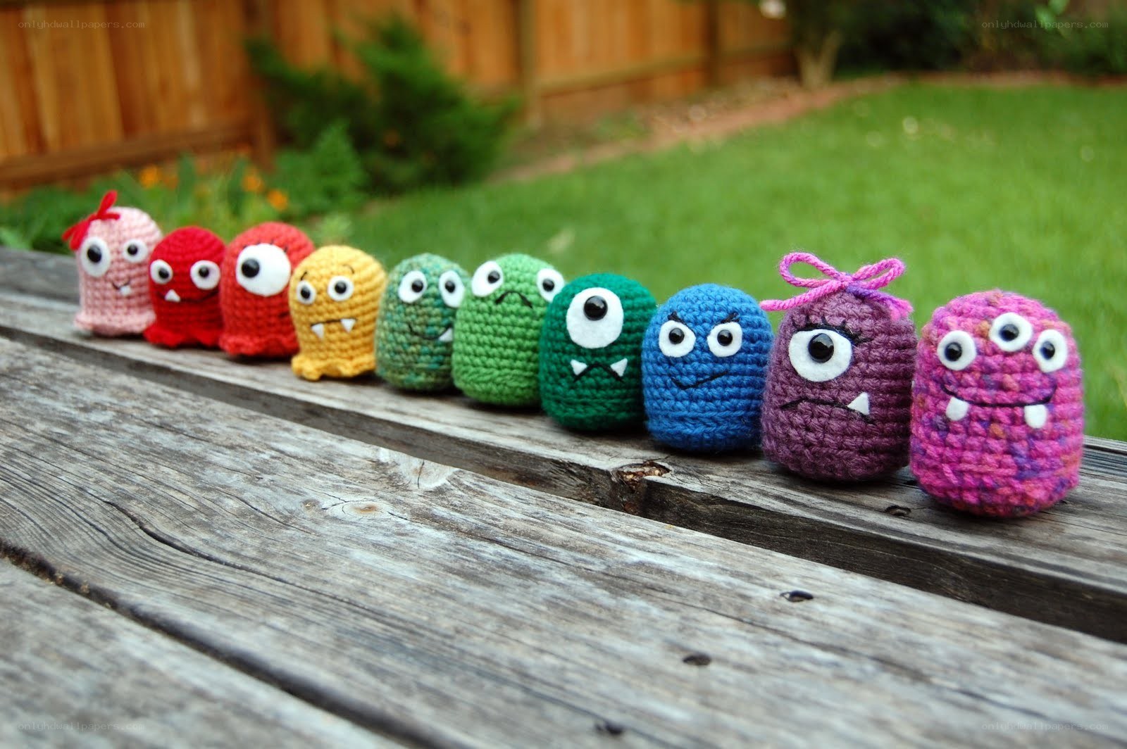 Colorful crocheted monsters