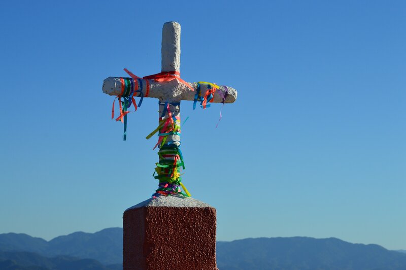 Colorful Cross on Mountain