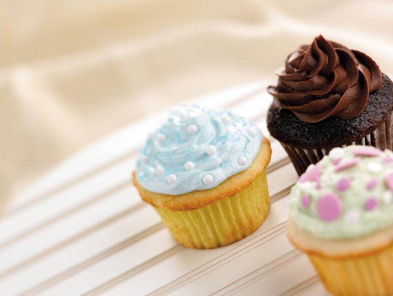 Colorful cupcakes on a tray