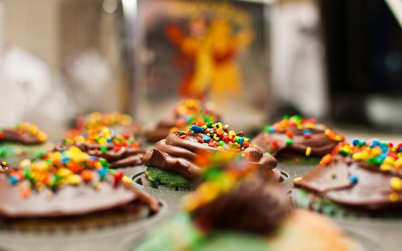 Colorful cupcakes with chocolate frosting