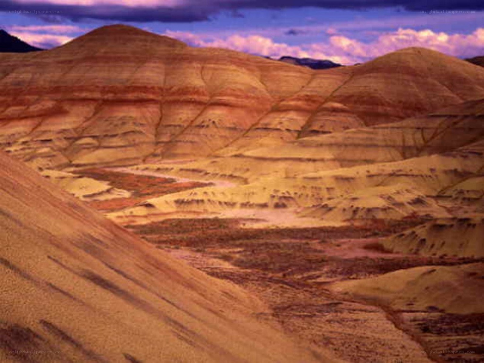 colorful desert hills at dusk