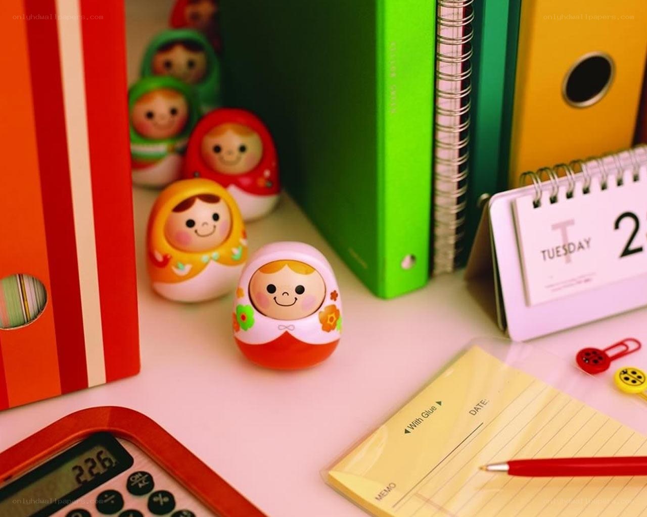 Colorful desk with matryoshka dolls