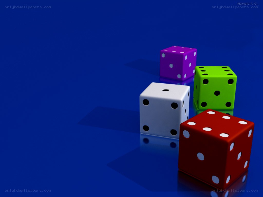 Colorful dice on blue surface