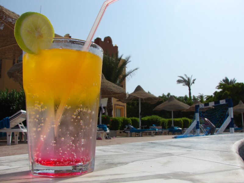 Colorful drink by poolside