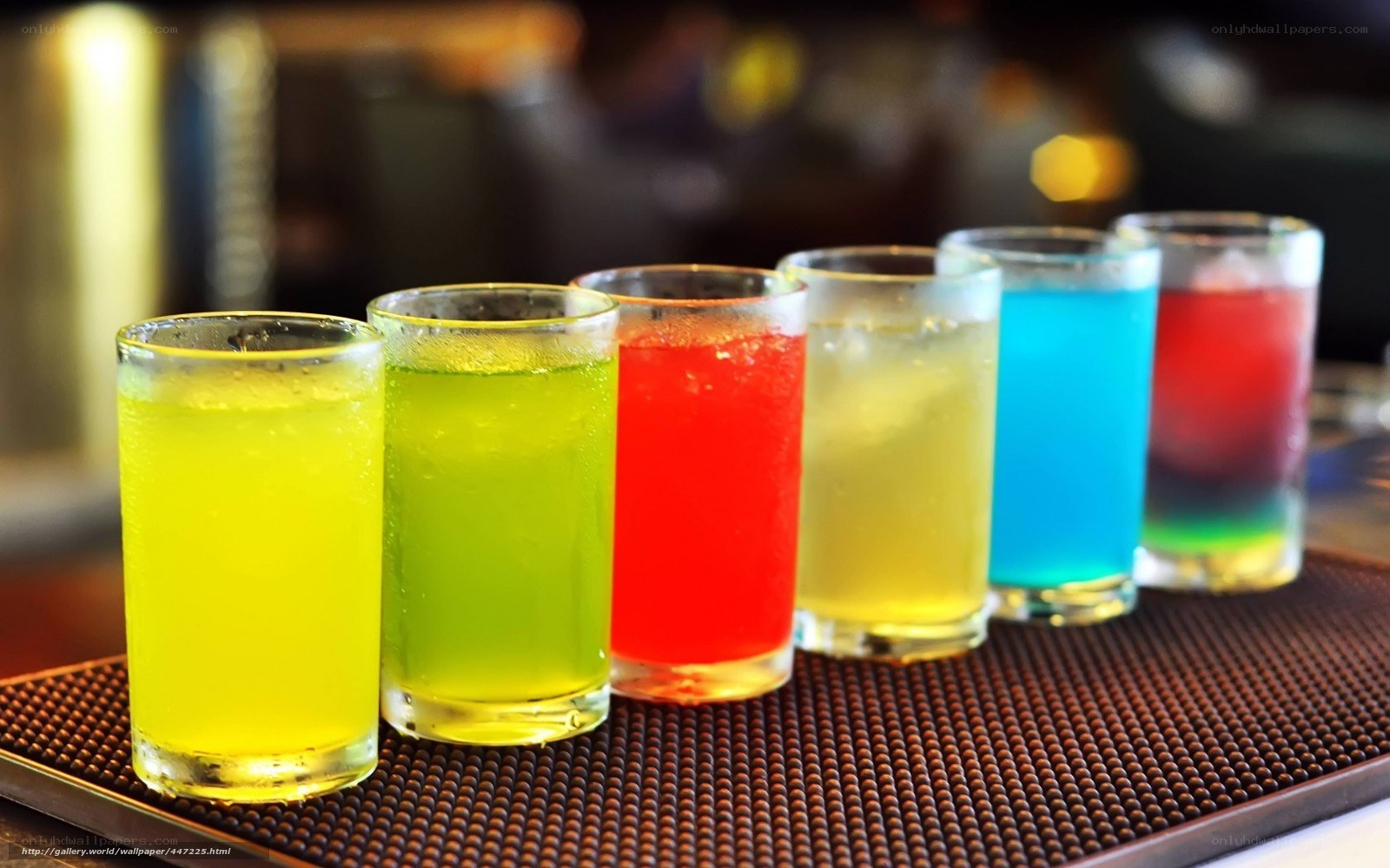 Colorful drinks on bar mat