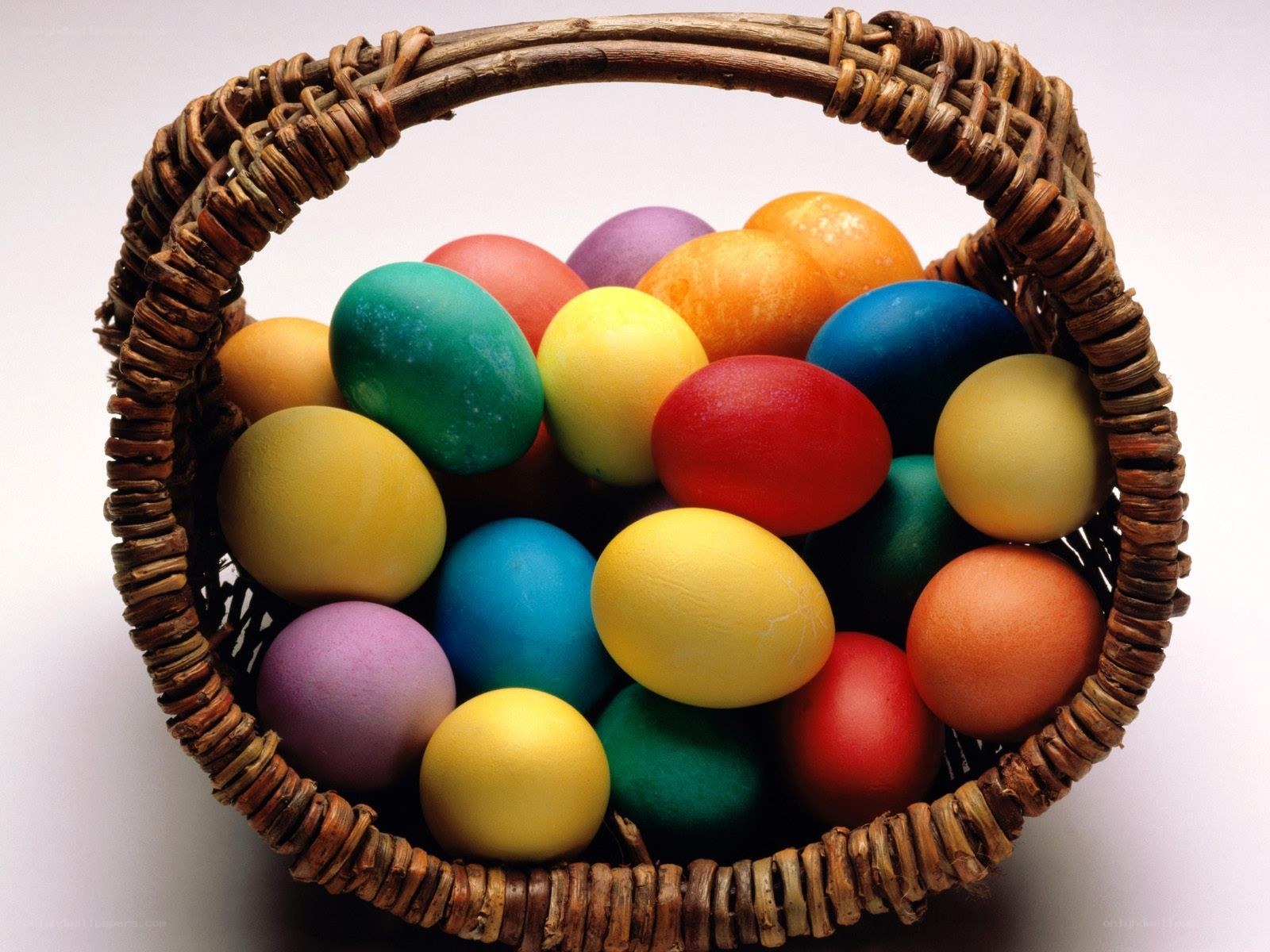 Colorful Easter eggs in a basket