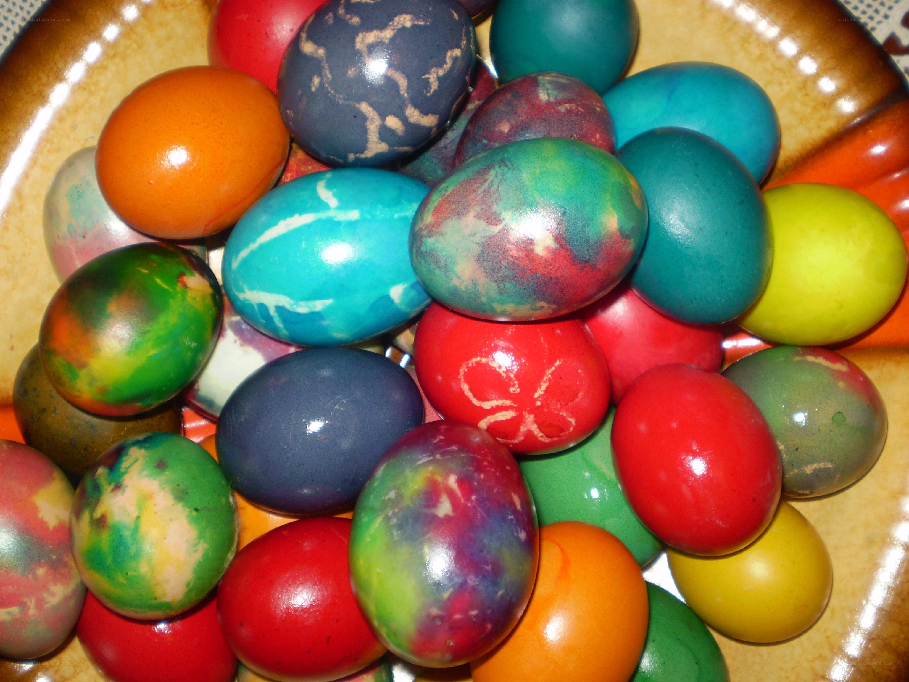 Colorful Easter eggs in a bowl