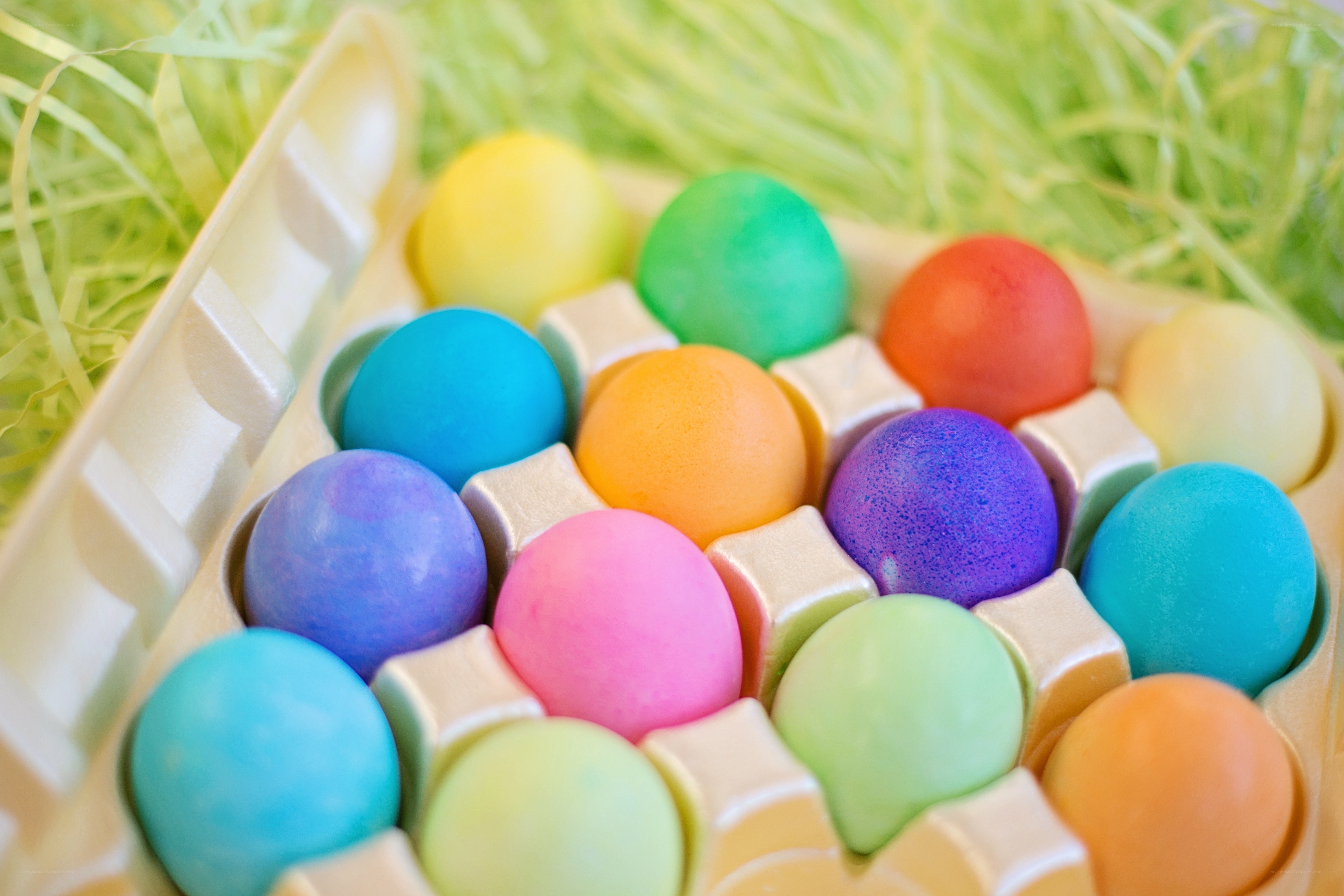 Colorful Easter eggs in carton