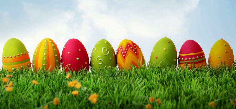 Colorful Easter Eggs in Grass — Green, Festive