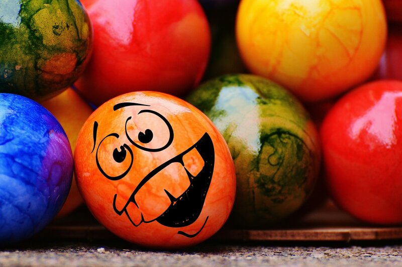 Colorful Easter eggs with cartoon face