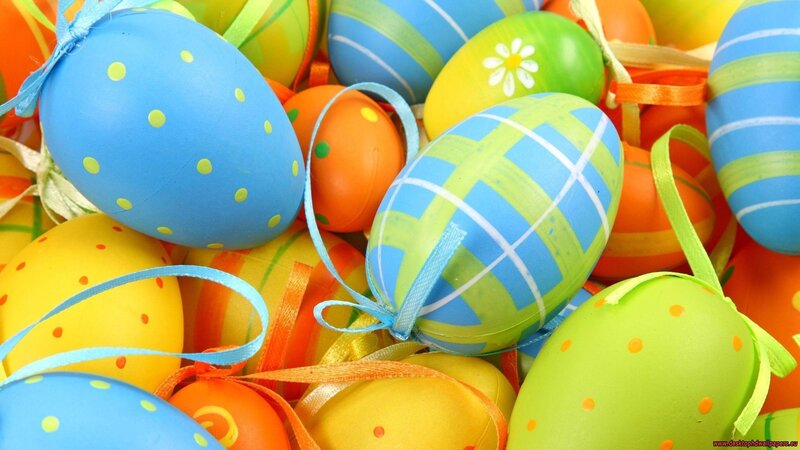 Colorful Easter eggs with ribbons