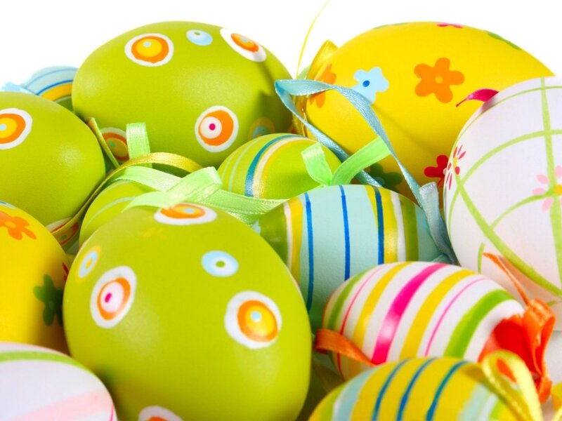 Colorful Easter eggs with ribbons