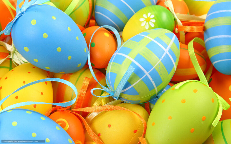 Colorful Easter eggs with ribbons