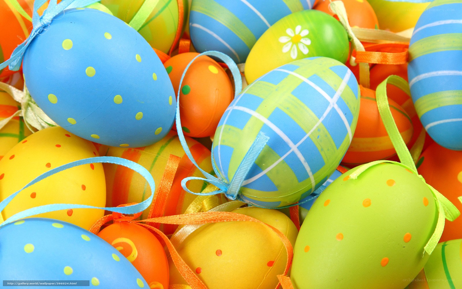 Colorful Easter eggs with ribbons