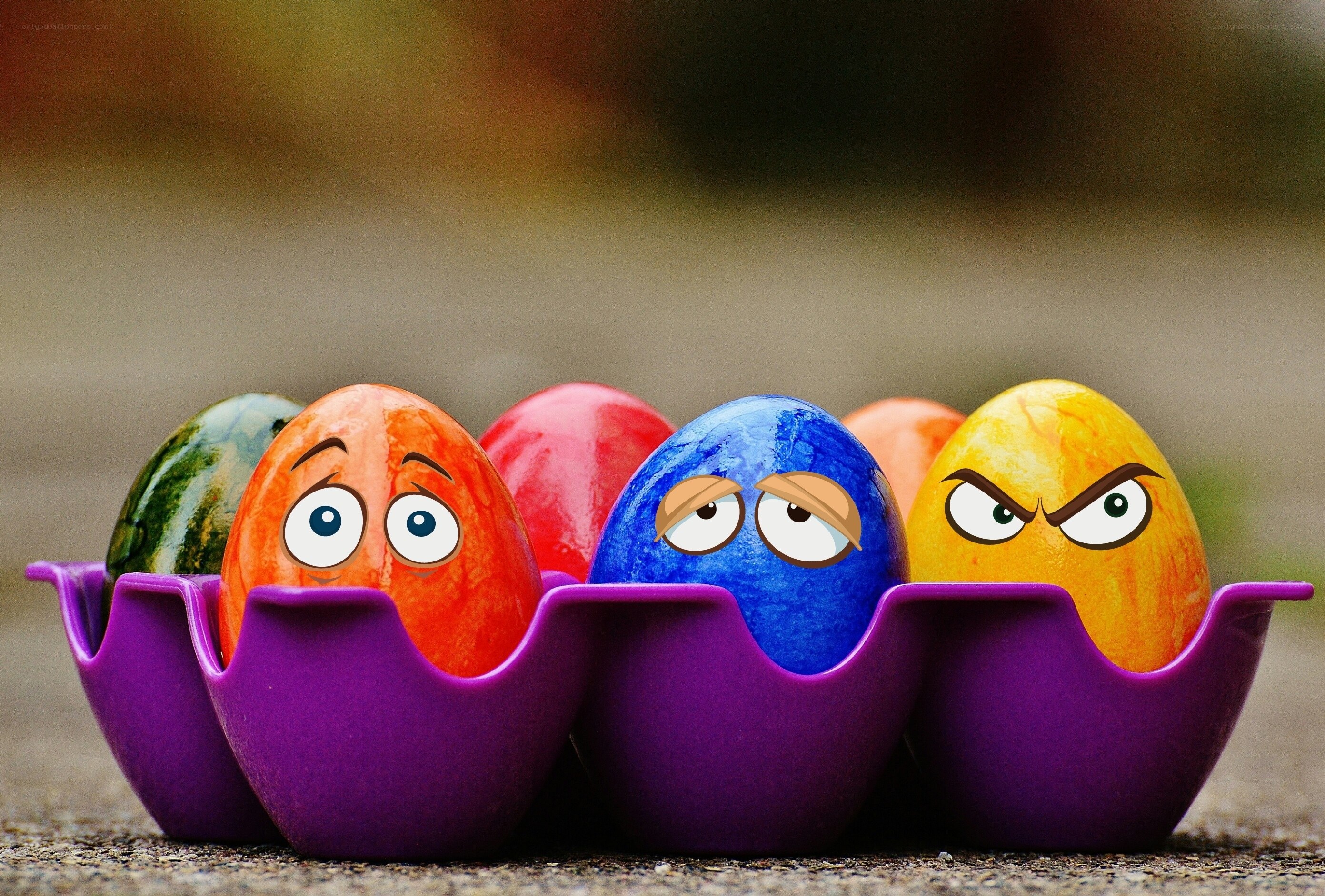 colorful eggs with cartoon faces