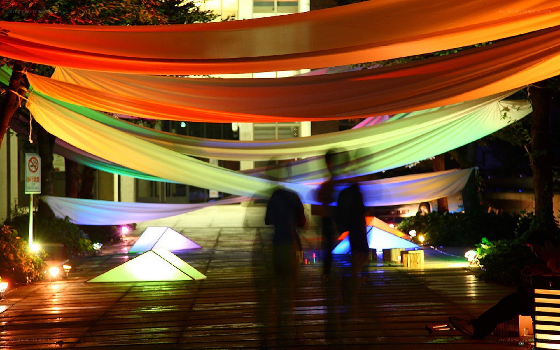 Colorful fabric installation at night