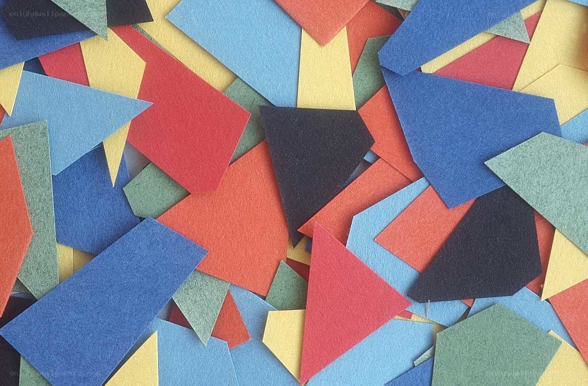 Colorful felt shapes scattered