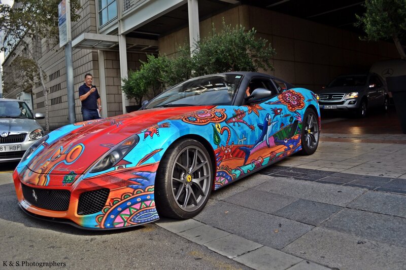 Colorful Ferrari on city street