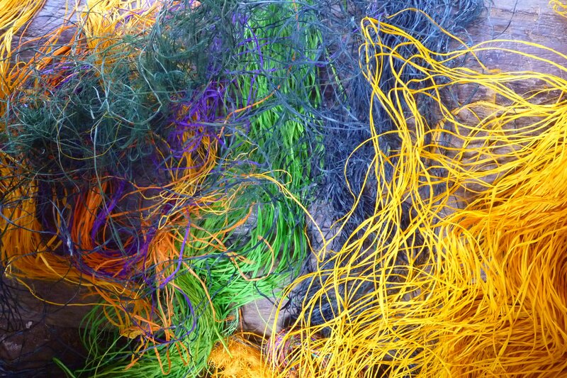 Colorful fibers on wood