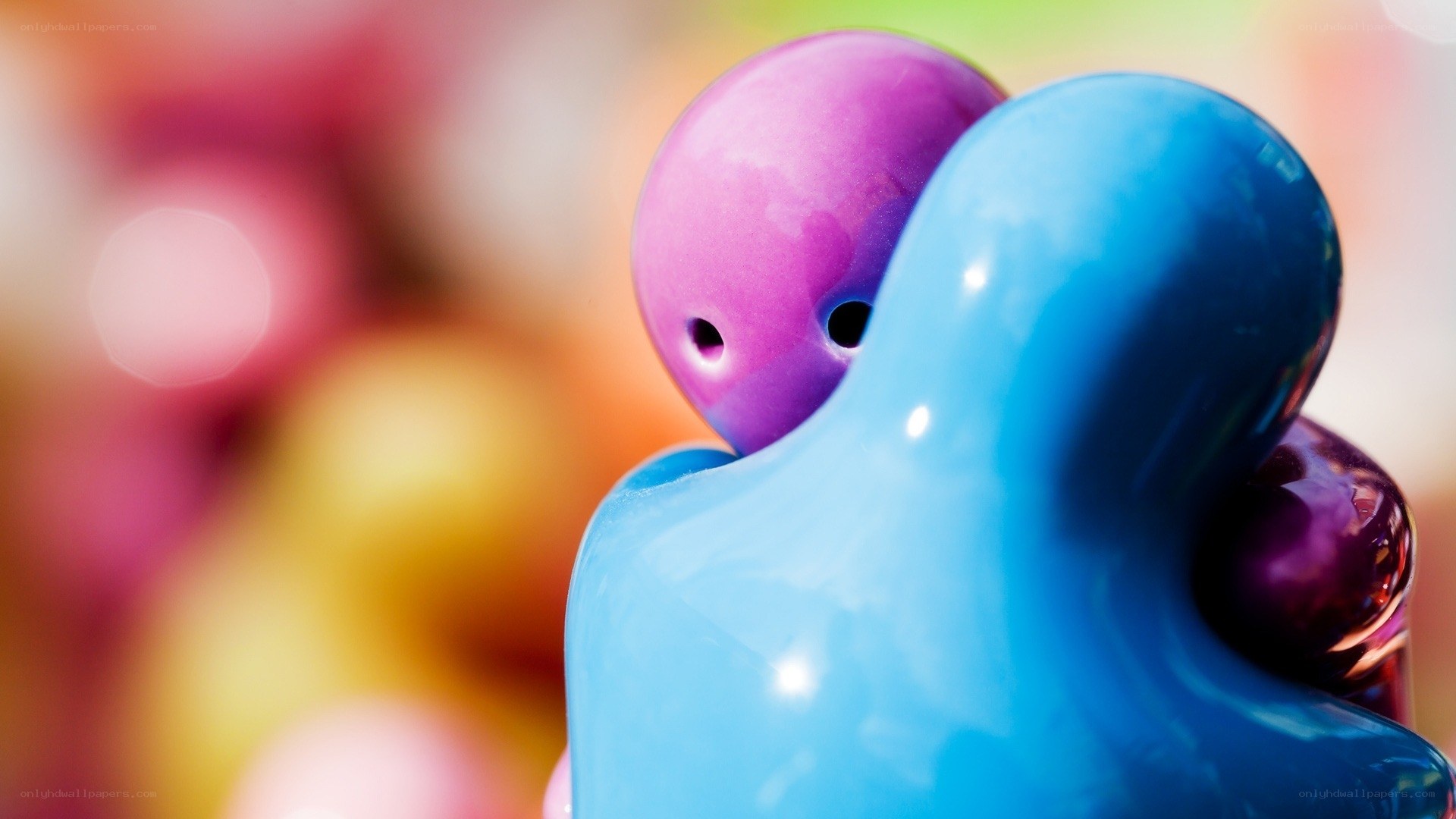 Colorful figurines hugging