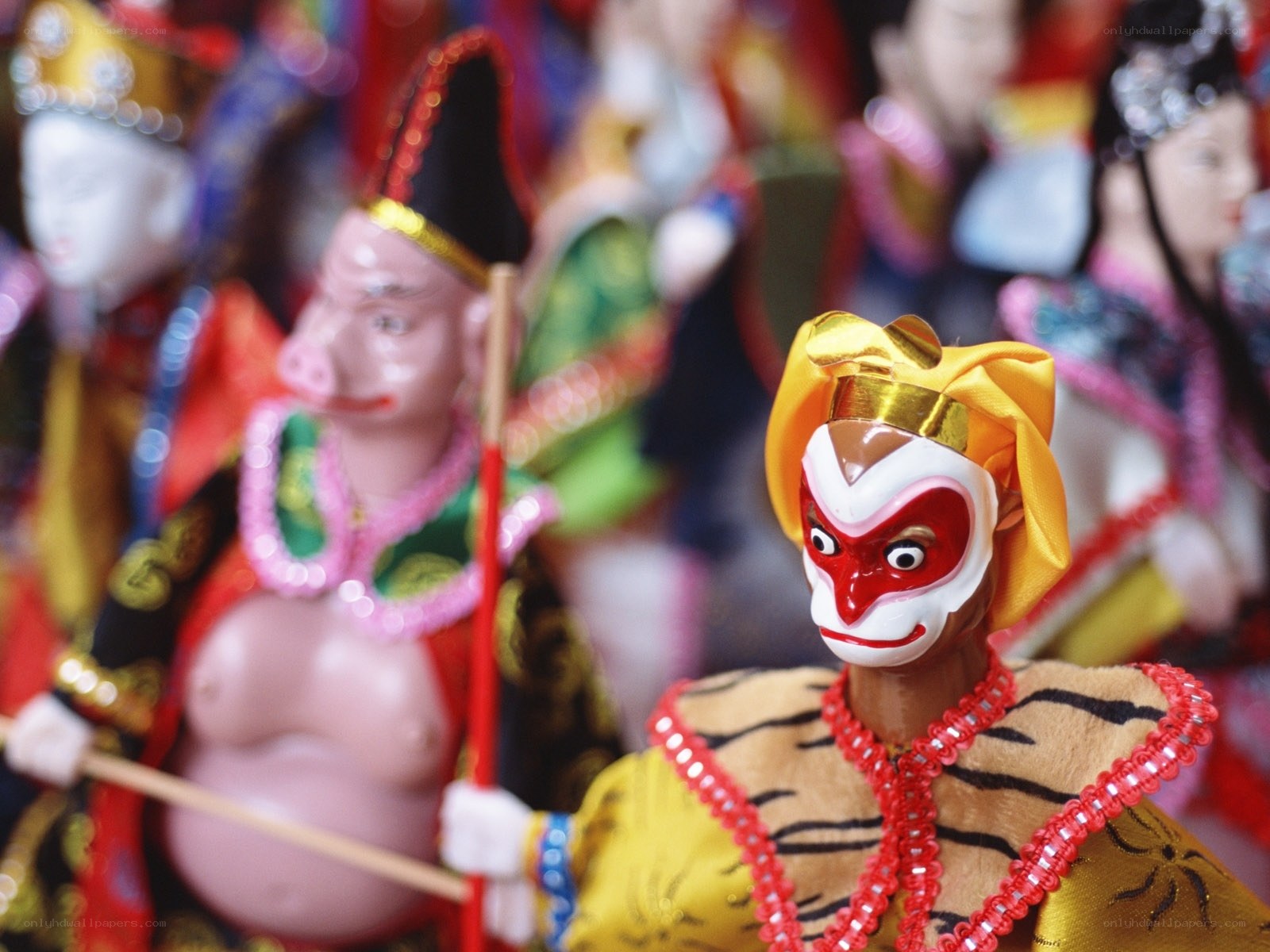 colorful figurines in traditional costumes