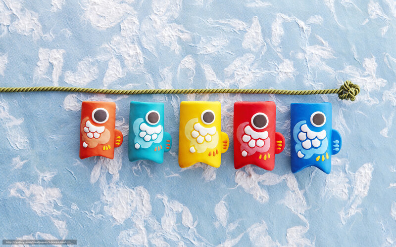 Colorful fish ornaments on string