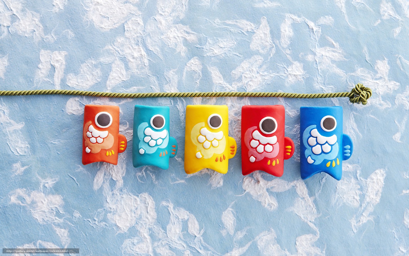 Colorful fish ornaments on string