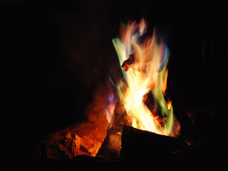 Colorful flames in the dark