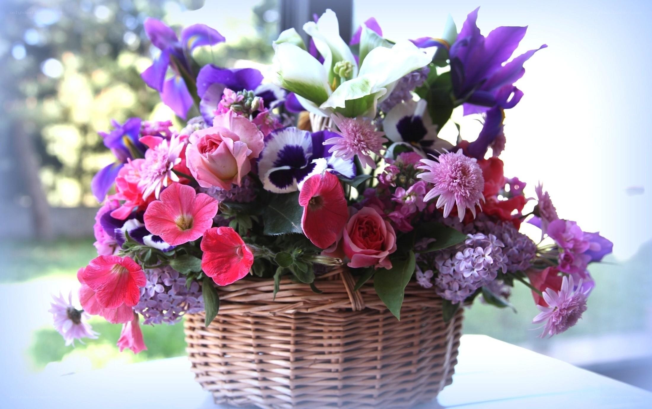 Colorful flower bouquet in basket