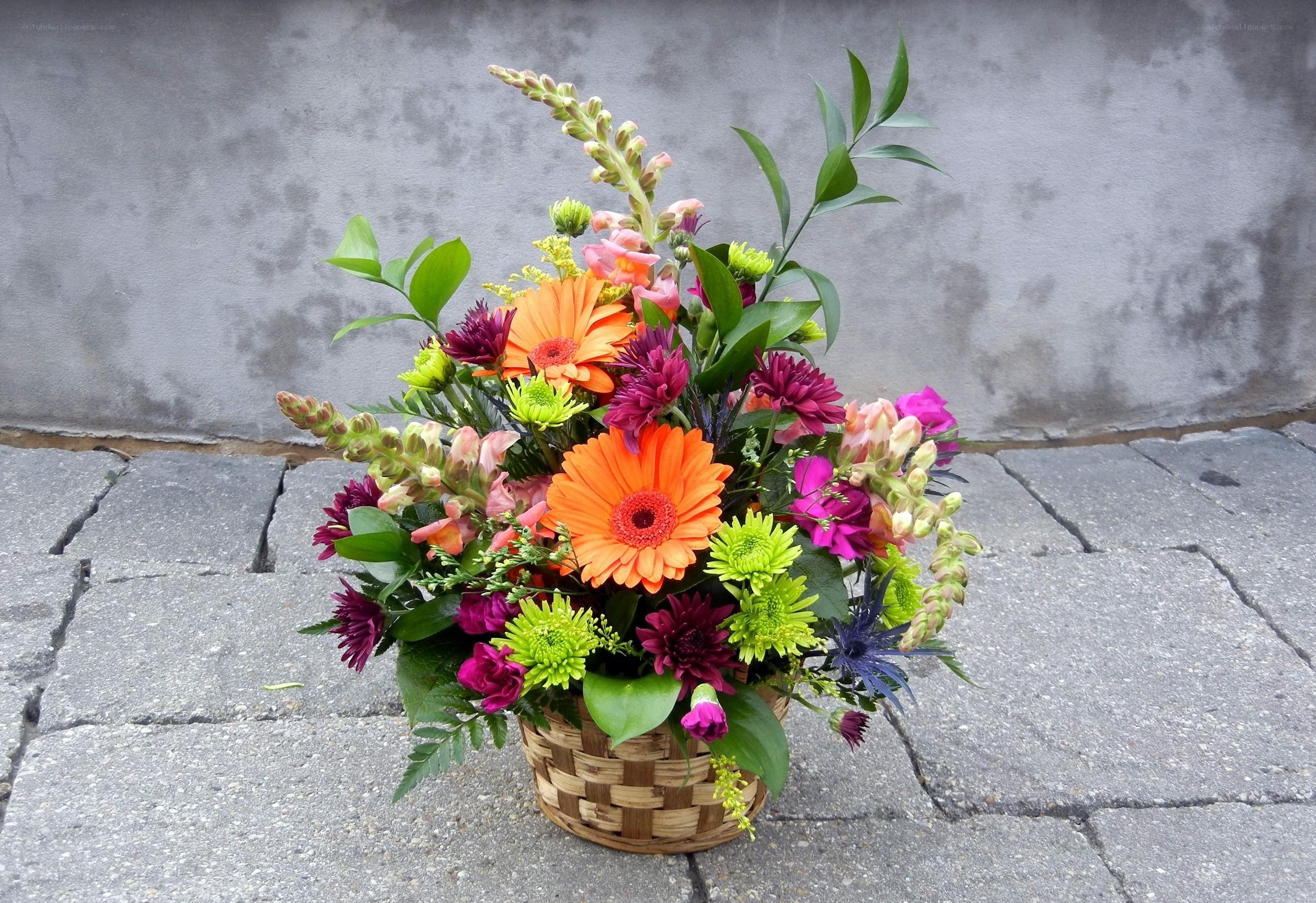 Colorful flower bouquet in basket