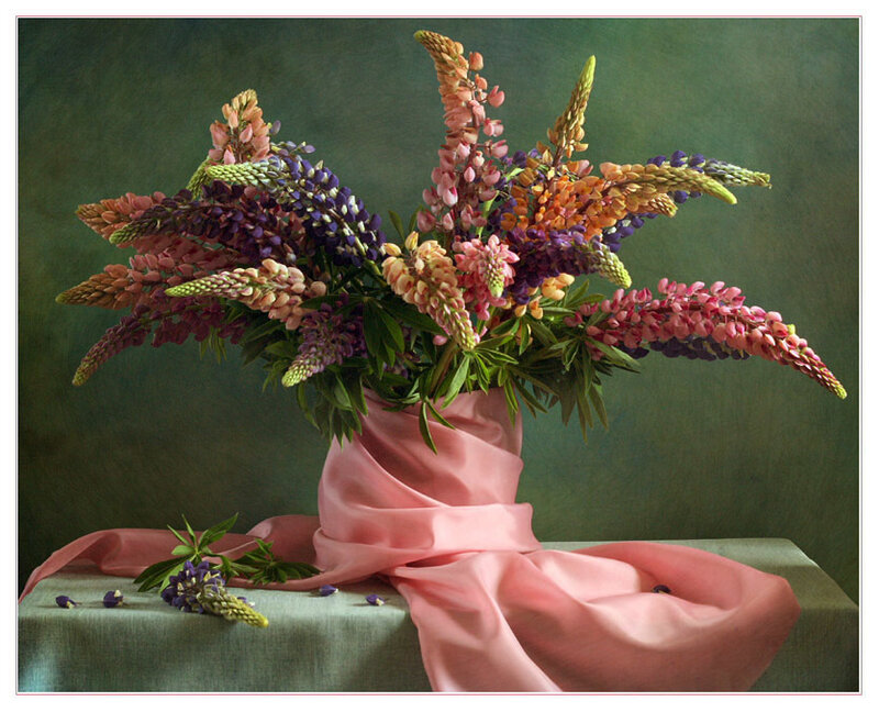 Colorful flower bouquet in pink cloth