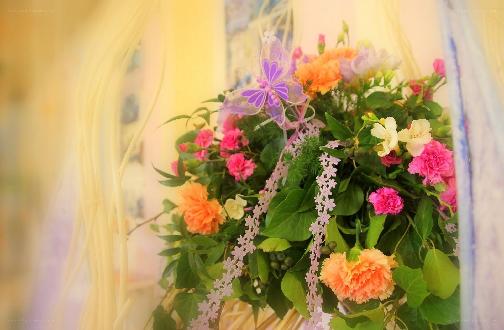 Colorful flower bouquet with butterfly