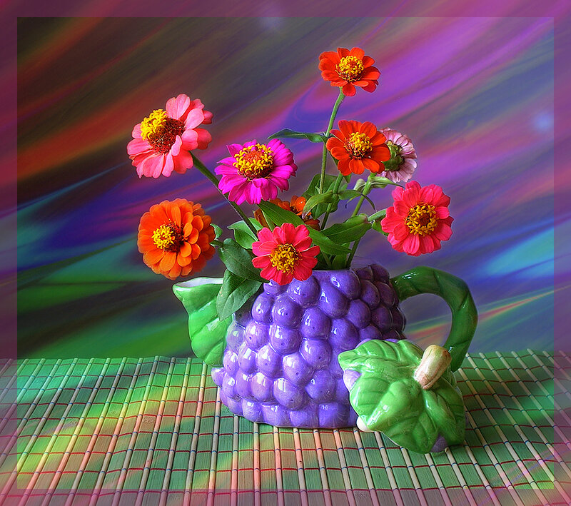 Colorful flowers in a purple vase