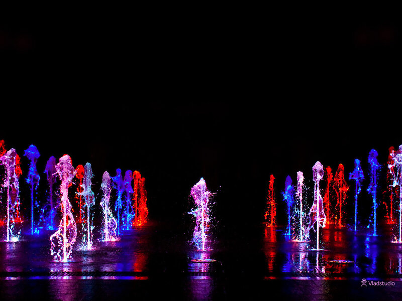 Colorful fountain display at night