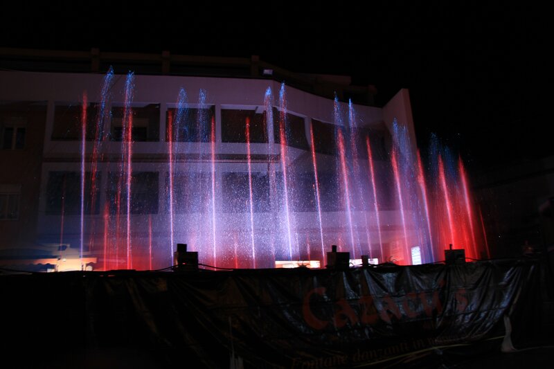 Colorful fountain display at night