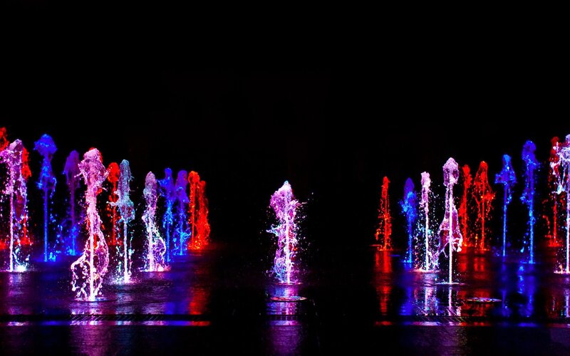 Colorful fountain display at night