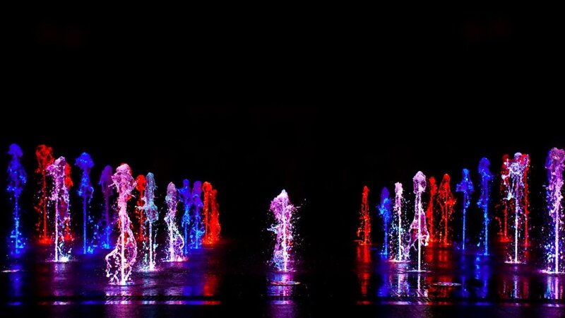 colorful fountain display at night