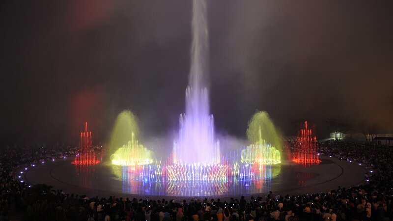 Colorful fountain show at night