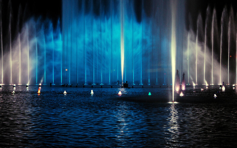Colorful fountain show at night