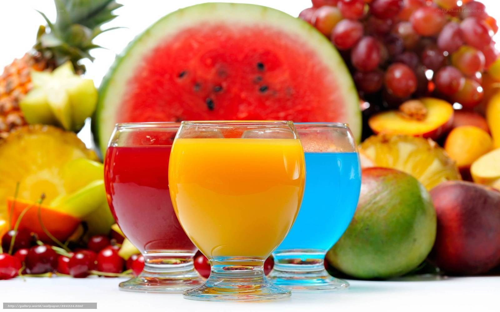 colorful fruit juices with fresh fruit