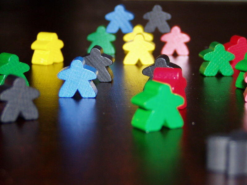 Colorful game pieces on table