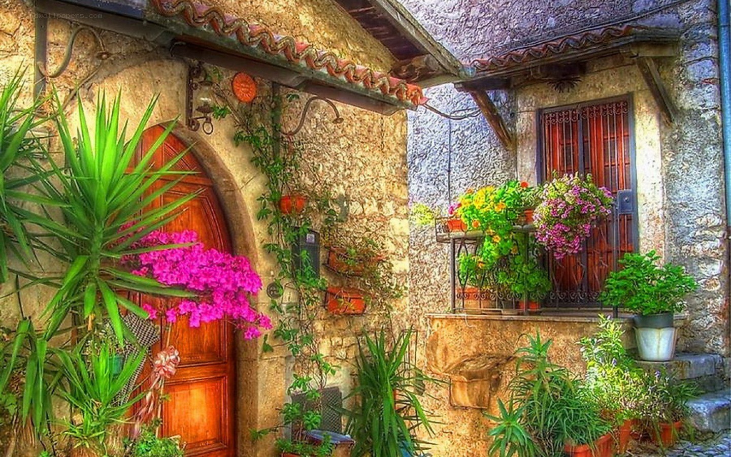 colorful garden at stone house